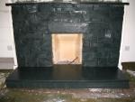 dark gray slate brick fireplace
